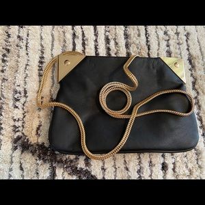 Black and gold purse